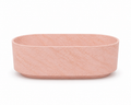 The "Aura" Monolithic Oblong Island Bathtub in Portuguese Pink Marble