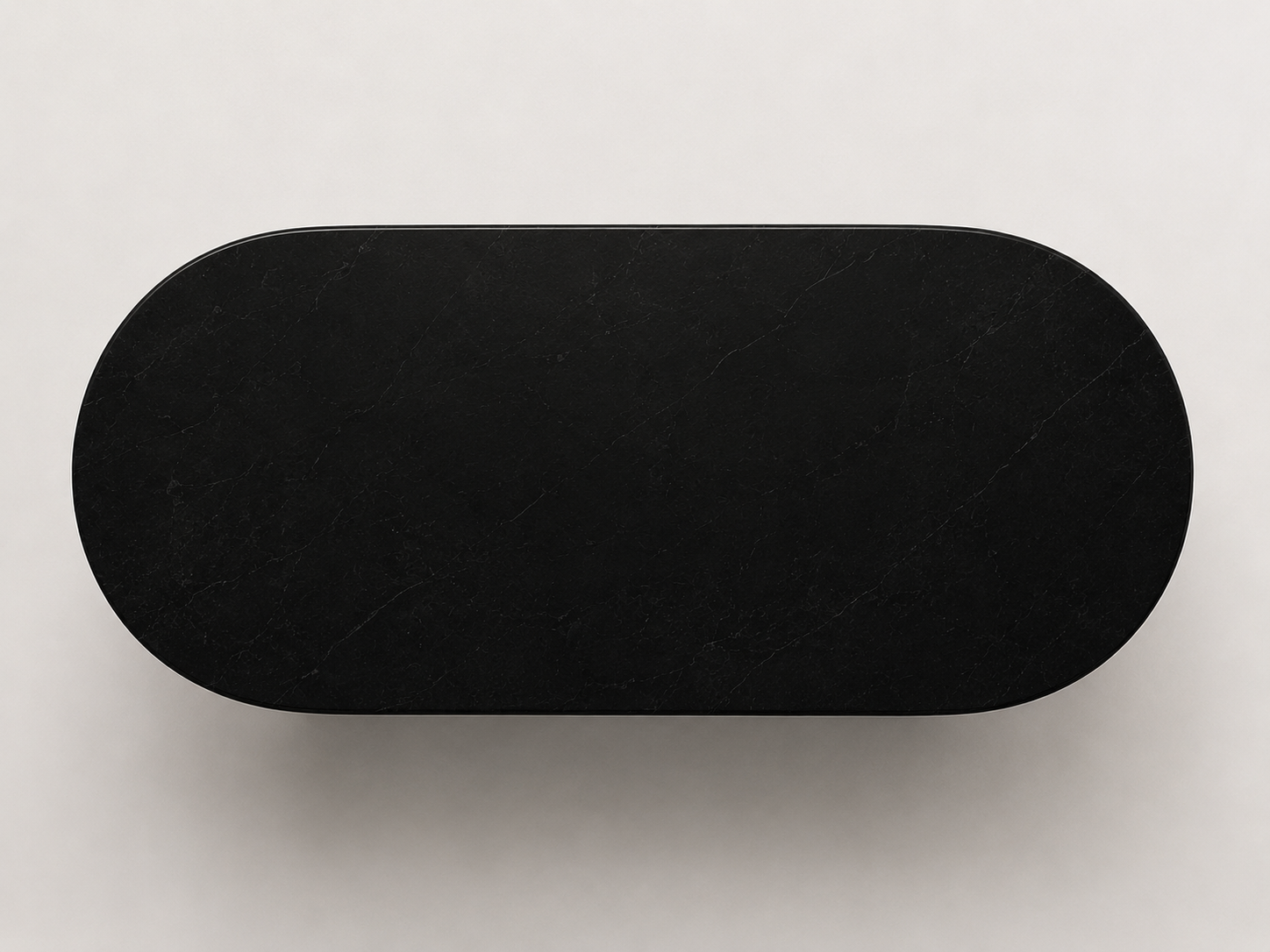 La Table de Repas Oblongue "Monolithe" en Marbre Noir Marquina